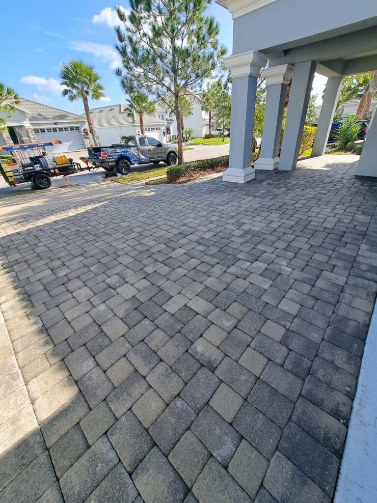 After photo ALT:
Clean paver driveway after paver driveway pressure washing